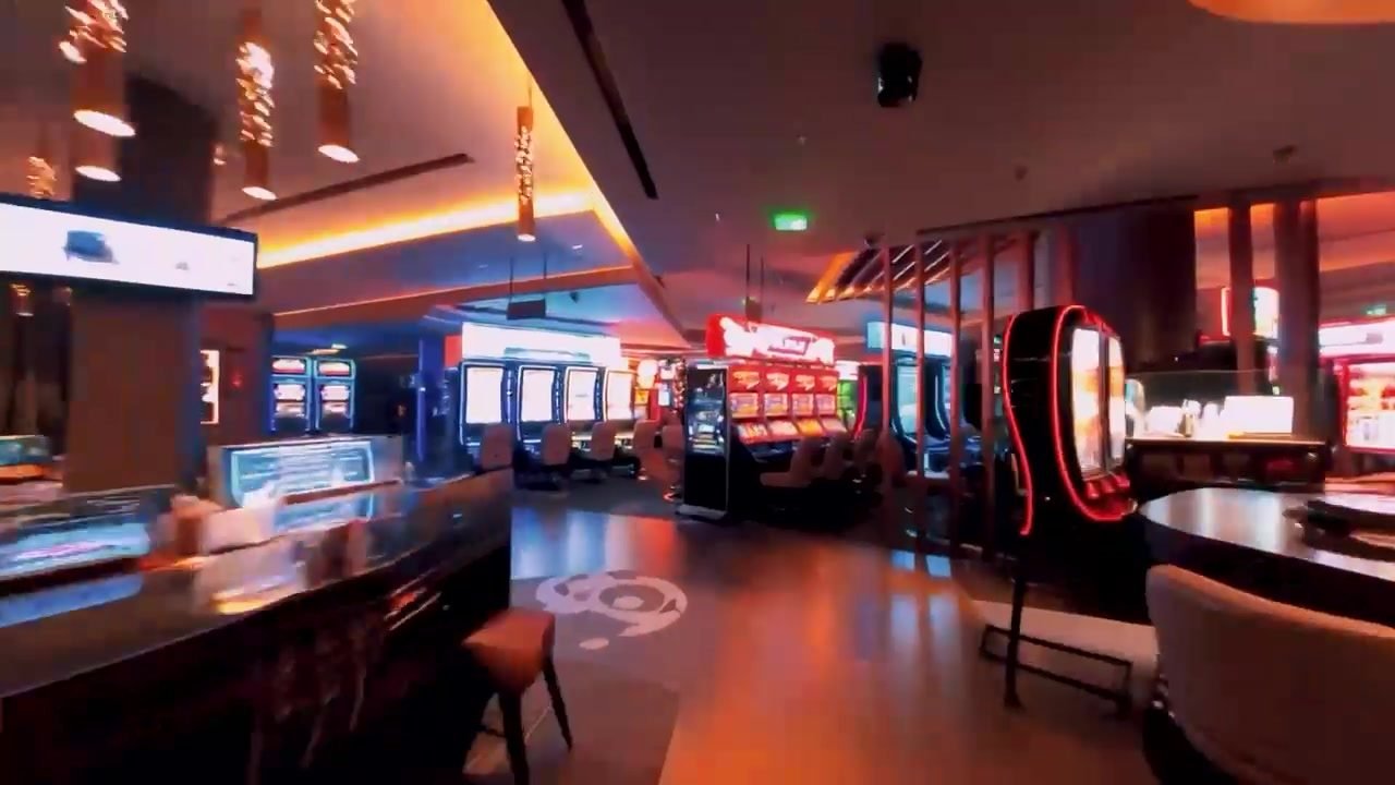The gaming floor and bar in warm evening light
