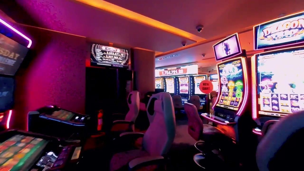 A neon-lit slots corner