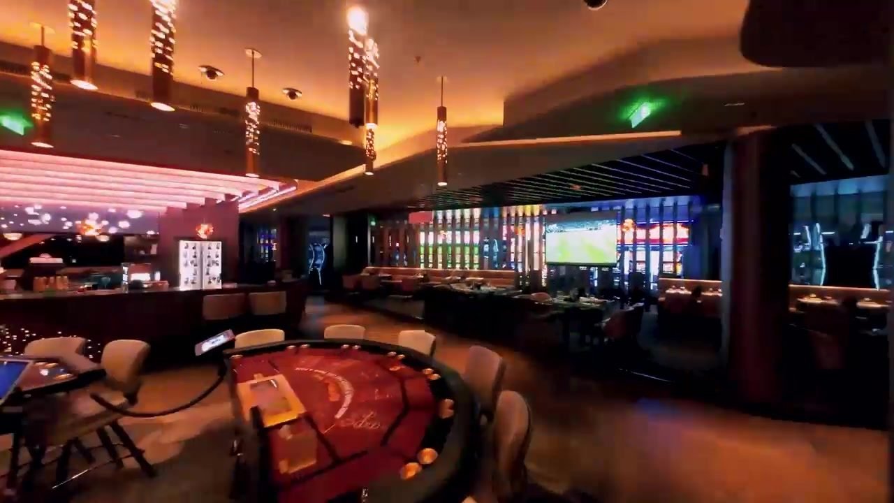 A roulette table on the gaming floor at night